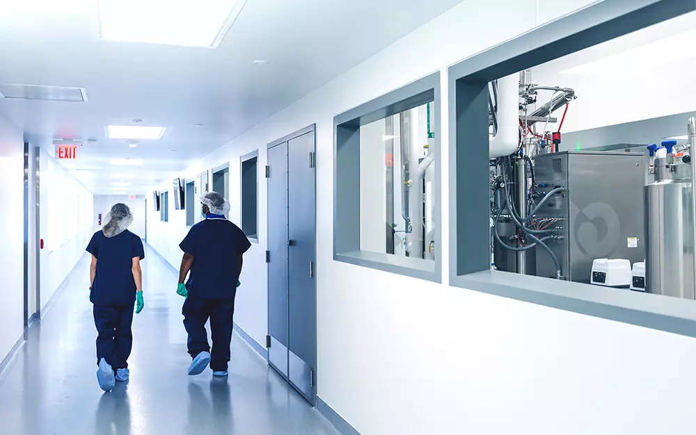 People walking down the corridor in the laboratory
